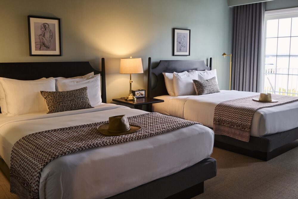 Two queen beds at The Harbor Front Inn.