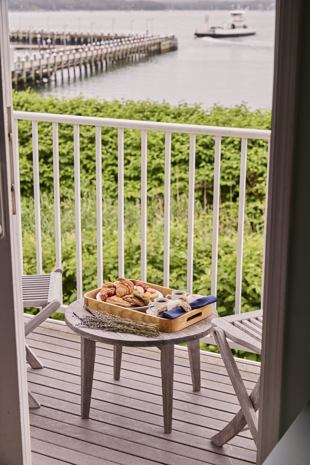 Breakfast pastries on the patio of a guest bedroom at The Harbor Front Inn