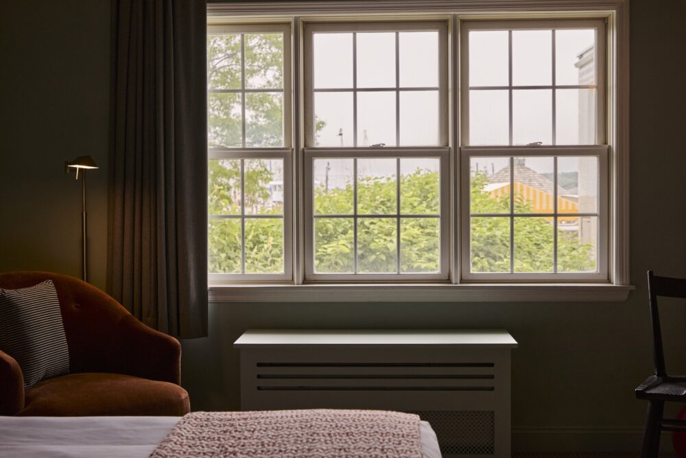 A king guest bedroom at The Harbor Front Inn.