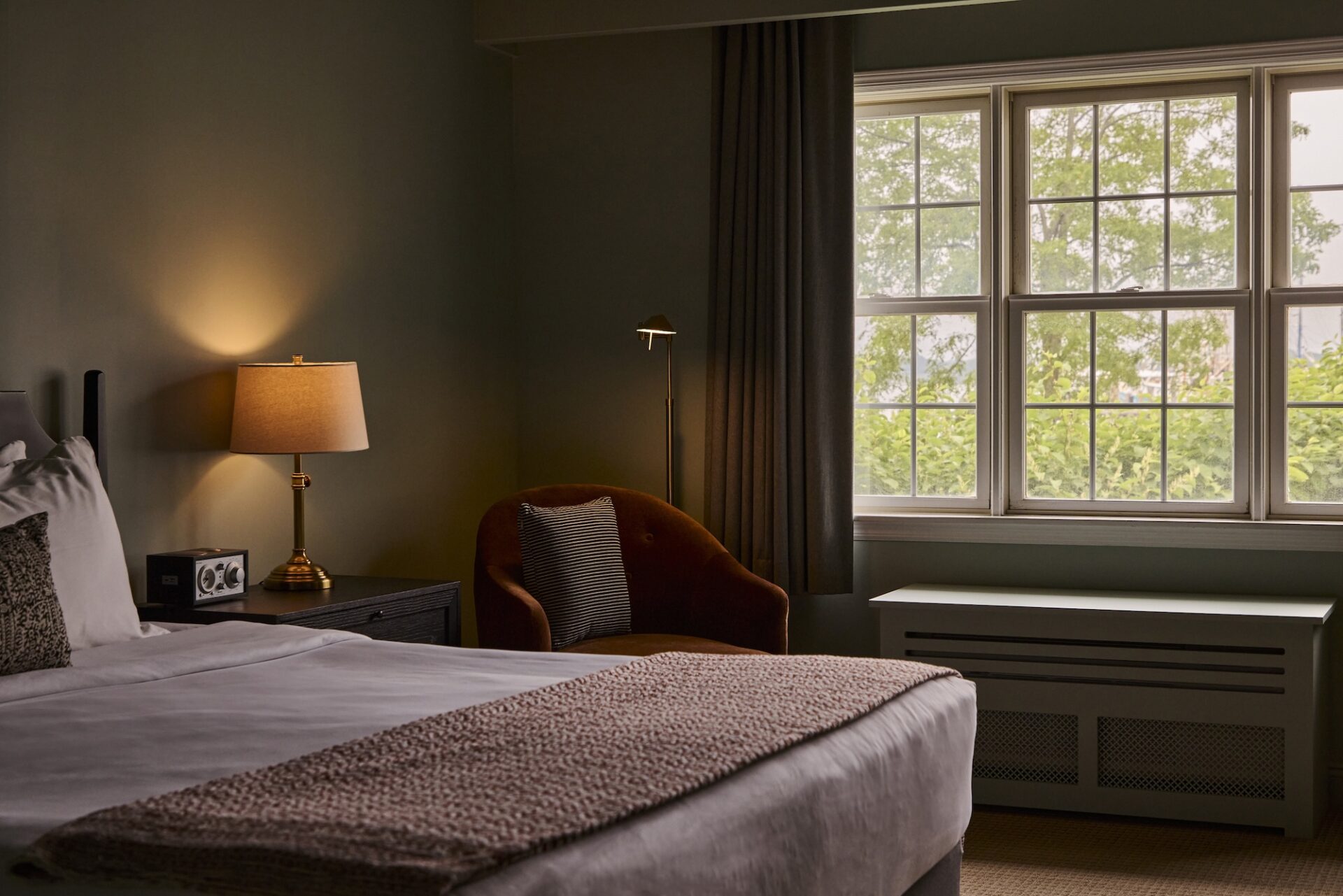A king guest bedroom at The Harbor Front Inn.