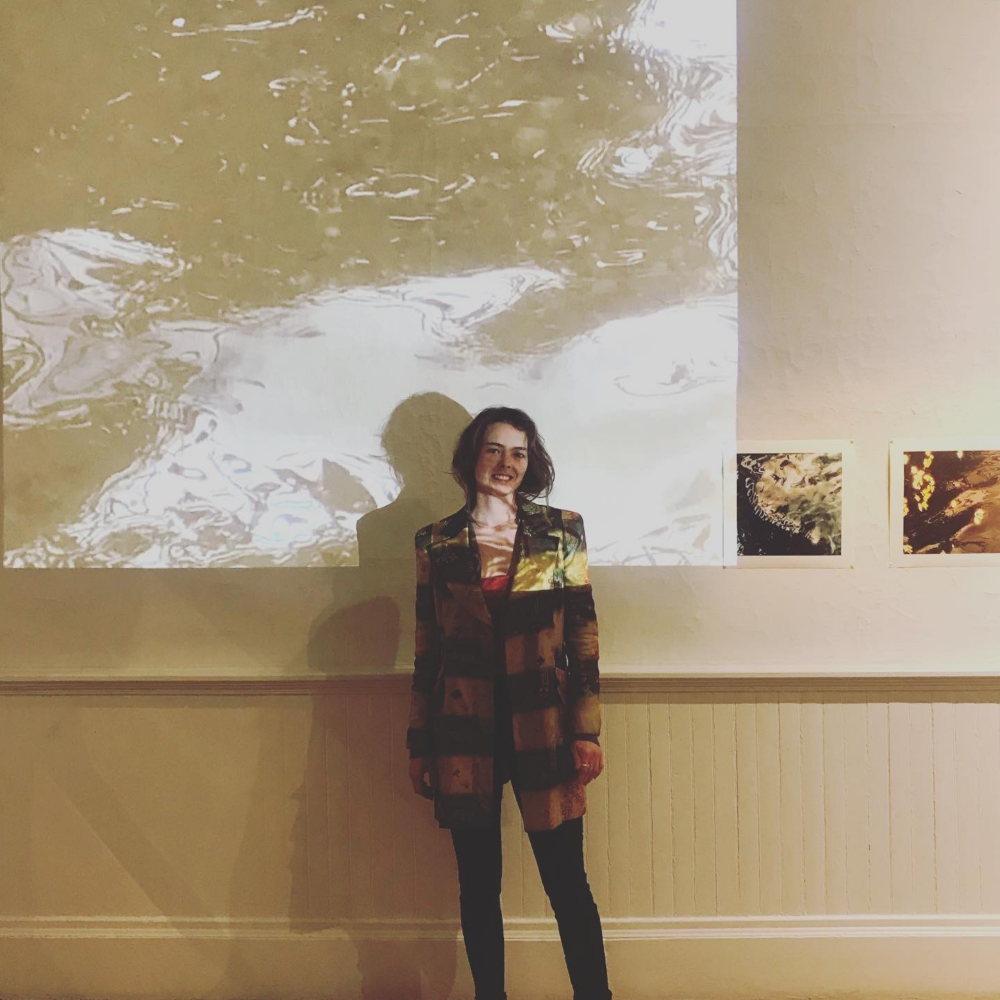 woman at art exhibit