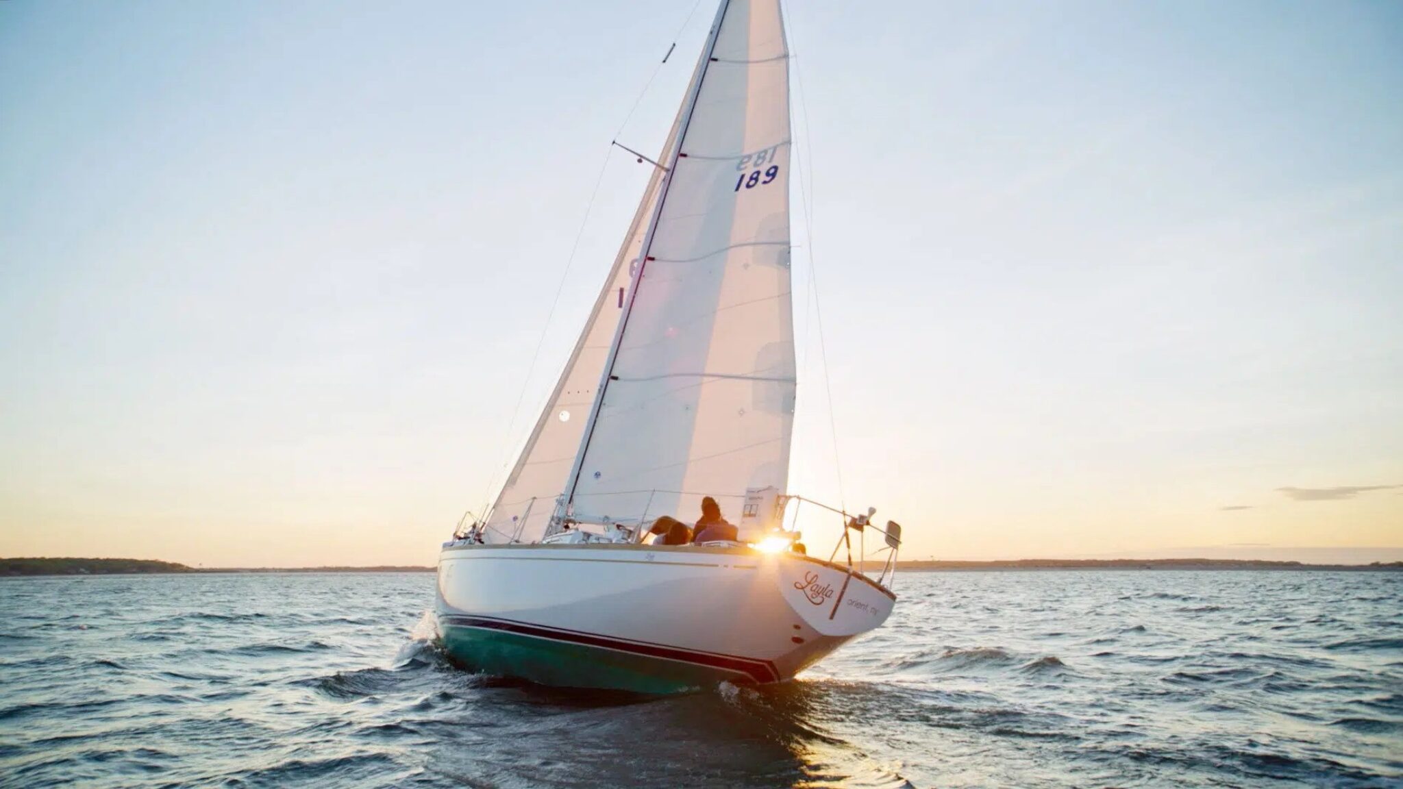 A sailboat in the harbor.