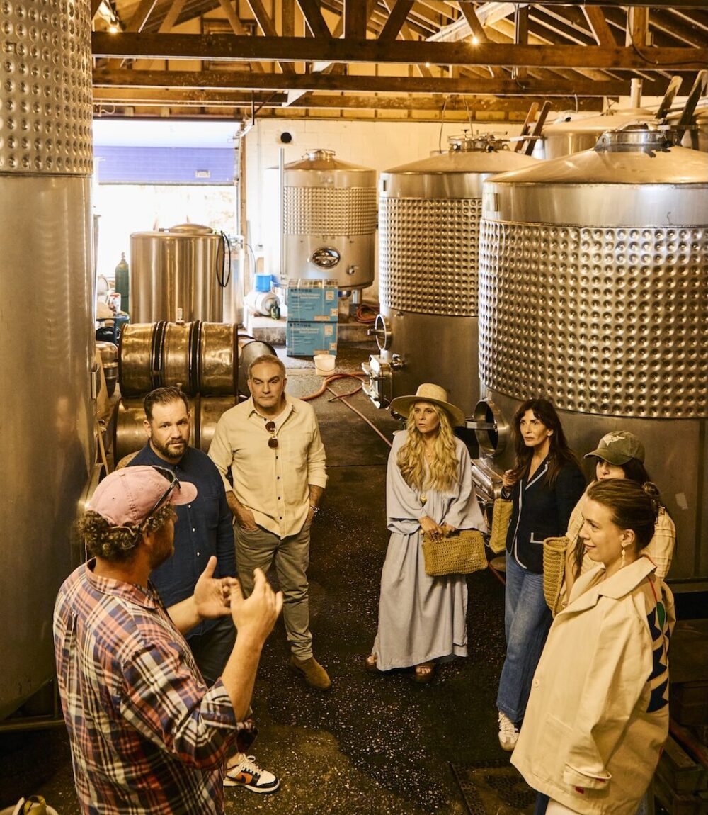 A group taking a tour of a winery in Greenport, NY.