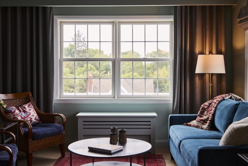 A spacious living room in a suite at The Harbor Front Inn.