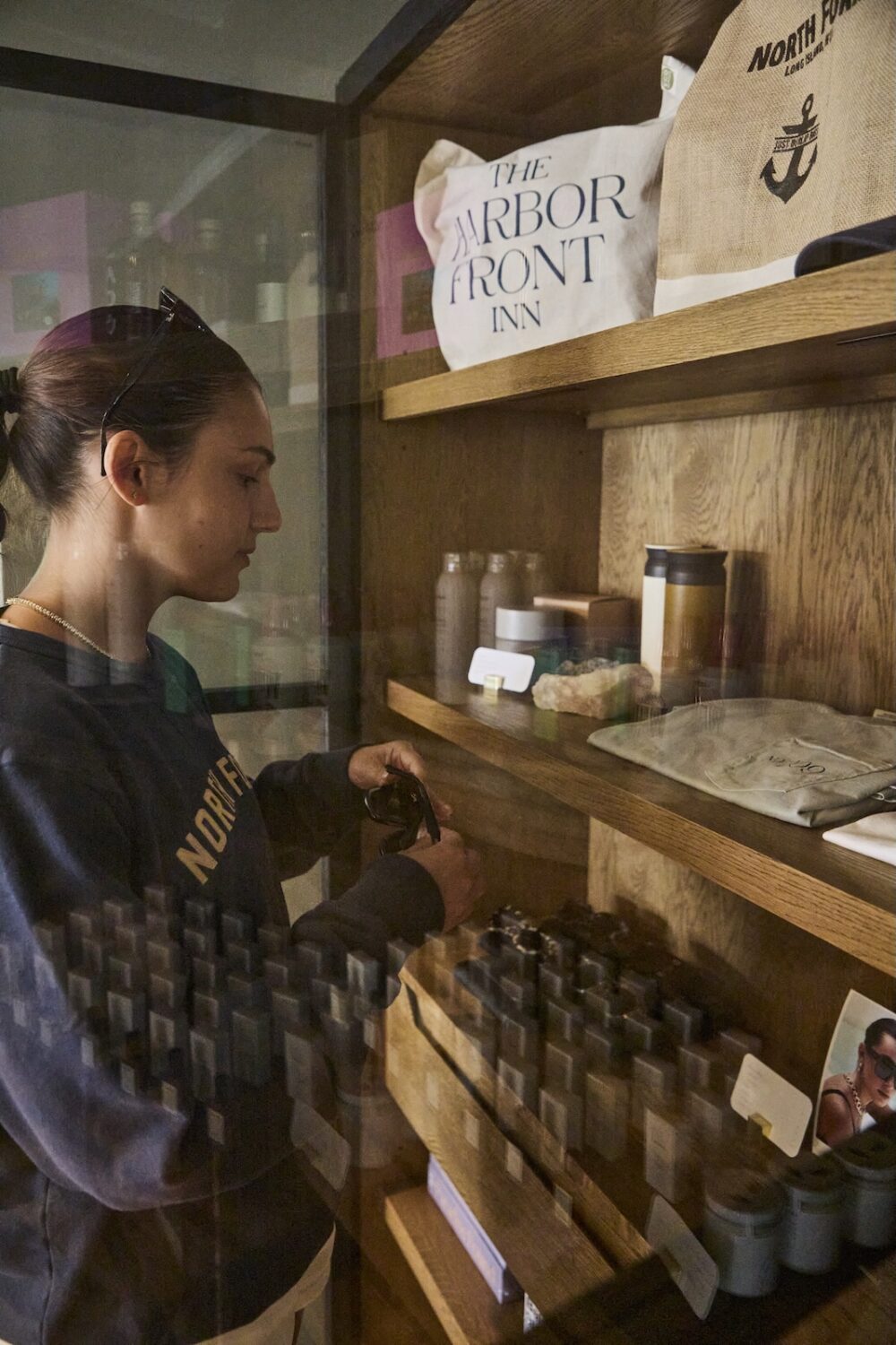 A woman shopping in the retail lobby at The Harbor Front Inn.