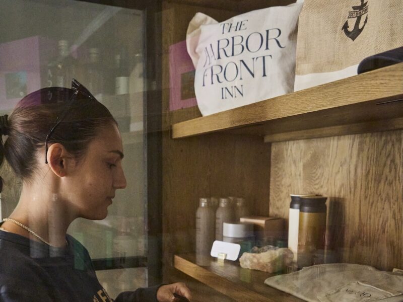 A woman shopping in the retail lobby at The Harbor Front Inn.